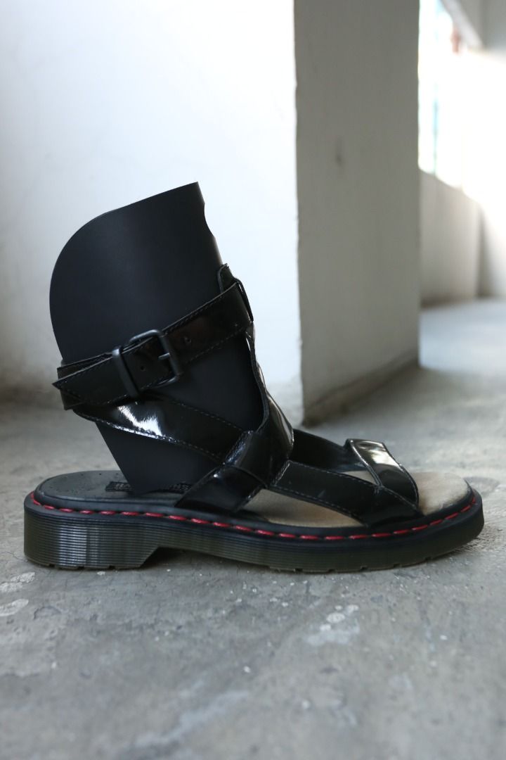 Raf Simons - Dr. Martens - S/S 09 - Wrap-Around Gladiator Sandals (Category: Casual Shoes) located in Manila. Submitted by graymatter_ (Listing ID 1444410045, Image 2). Description: Raf Simons - Dr. Martens - S/S 09 - Wrap-Around Gladiator Sandals Tagged Size: 9 Condition: 8.5/10 Flaws: Hairline Cracks on Patent, Leather Chipping on Insole Material: Patent Leather Made in: China .