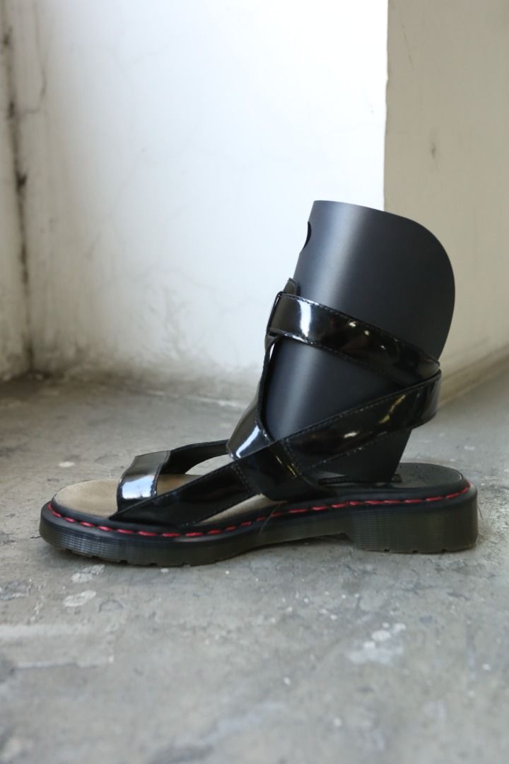 Raf Simons - Dr. Martens - S/S 09 - Wrap-Around Gladiator Sandals (Category: Casual Shoes) located in Manila. Submitted by graymatter_ (Listing ID 1444410045, Image 3). Description: Raf Simons - Dr. Martens - S/S 09 - Wrap-Around Gladiator Sandals Tagged Size: 9 Condition: 8.5/10 Flaws: Hairline Cracks on Patent, Leather Chipping on Insole Material: Patent Leather Made in: China .