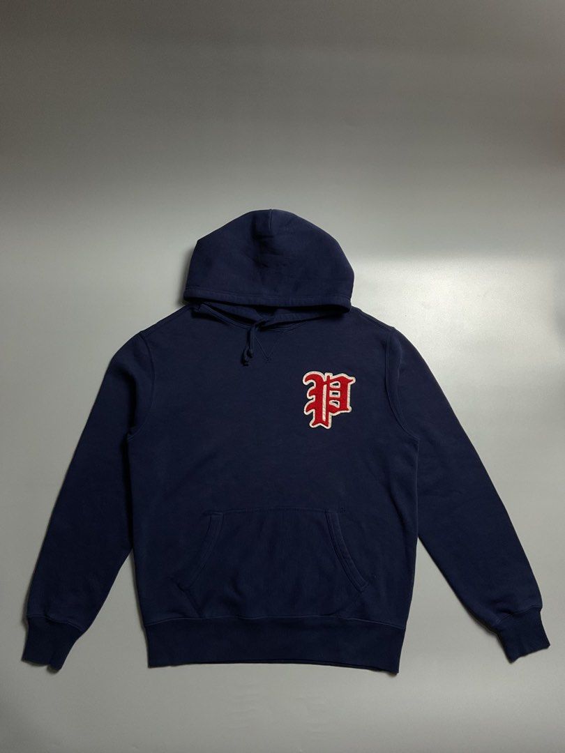 Ralph Lauren Hoodie (Category: Coats, Jackets and Outerwear) located in San Pablo. Submitted by pj_thrifthings (Listing ID 1444430201, Image 1). Description: Polo Ralph Lauren Hoodie This Polo Ralph Lauren hoodie features a navy blue cotton blend body and a varsity-style “P” chenille patch on the chest. Medium on tag Width - 23 Length - 28 Flawless No issues Can do shipping nationwide .