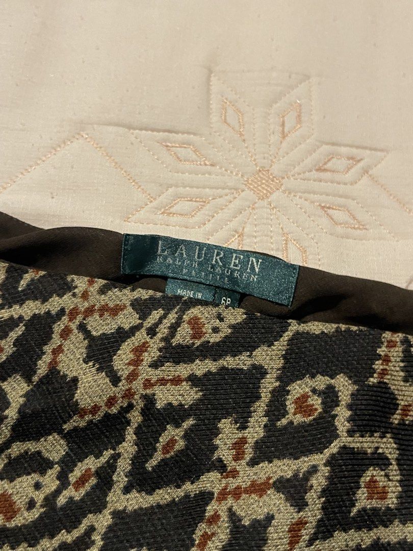 Ralph Lauren Midi Skirt (Category: Skirts) located in Manila. Submitted by stargirl05 (Listing ID 1444420770, Image 2). Description: - Lauren Ralph Lauren petite skirt - Beautiful patterned fabric - Midi length with a slight flare - Dark brown lining for opacity - Perfect for dressing up or down.