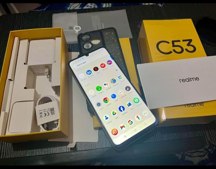 REALME C53 6/128gb 100% original! (Category: Realme) located in Santa Rosa. Submitted by cyberspacemarket123 (Listing ID 1444341889, Image 2). Description: Realme C53 100% original mga boss hindi premium copy hindi ren fake. 100% original mga bossing complete with box with original realme charger adapter and cord nia na never pa po nagagamit bago pa yan ung charger nia never pa po nagamit mga boss check mo pa mabute malinaw camera matagal malowba