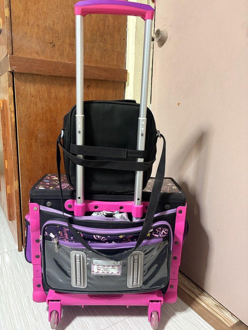 Robby Rabbit Princess Rolling Backpack with Lunch Bag (Category: Strollers) located in Manila. Submitted by supermomma17 (Listing ID 1444448759, Image 2). Description: bought 5k minsan lang gamitin kasi iniiwan ang books sa room like new no issue 3k Muntinlupa Area Lalamove only.