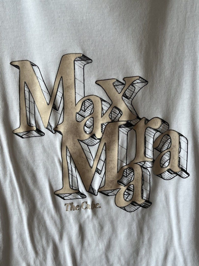 S MaxMara 'The Cube' White T-Shirt with Logo (Category: Tshirts & Polo Shirts ) located in Manila. Submitted by tinkerbellaxoxo (Listing ID 1444492837, Image 3). Description: - White S MaxMara t-shirt - Features 'The Cube' logo graphic on the front - Short sleeves and crew neck - Comfortable and casual, ideal for everyday wear - Easy to style with jeans or shorts Once the item has been shipped and handed over to the courier, I am no longer respon
