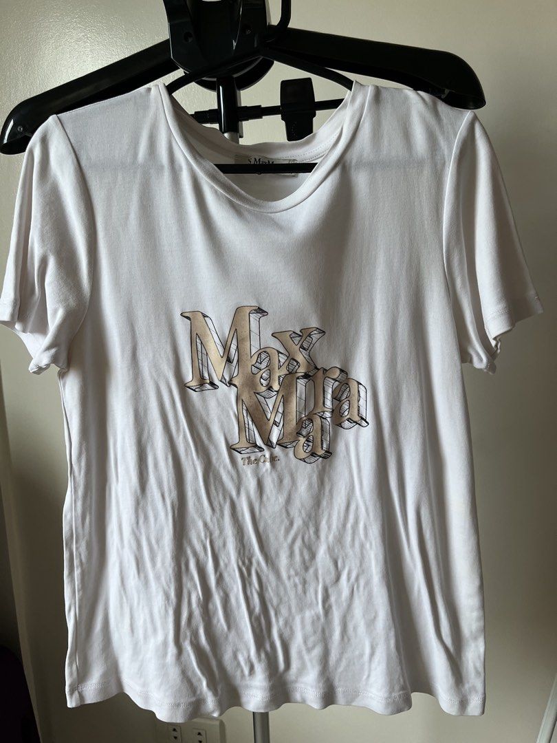 S MaxMara 'The Cube' White T-Shirt with Logo (Category: Tshirts & Polo Shirts ) located in Manila. Submitted by tinkerbellaxoxo (Listing ID 1444492837, Image 1). Description: - White S MaxMara t-shirt - Features 'The Cube' logo graphic on the front - Short sleeves and crew neck - Comfortable and casual, ideal for everyday wear - Easy to style with jeans or shorts Once the item has been shipped and handed over to the courier, I am no longer respon