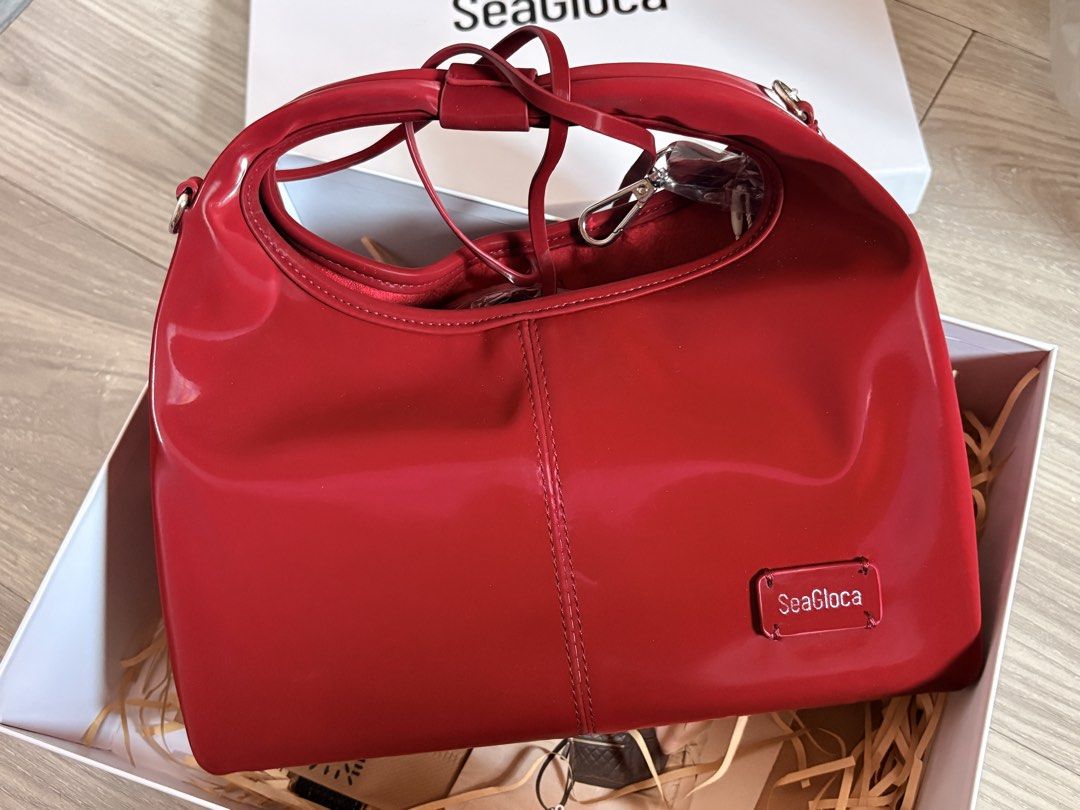 SeaGloca Bag with Box (Category: Luxury Bags & Wallets) located in Agdangan. Submitted by ririi_cat (Listing ID 1444344147, Image 2). Description: - Brand: SeaGloca - Features: Unique curved handle, detachable strap - Includes: Original box and packaging - Brand new/ Never been used 📍Dasmariñas, Cavite.