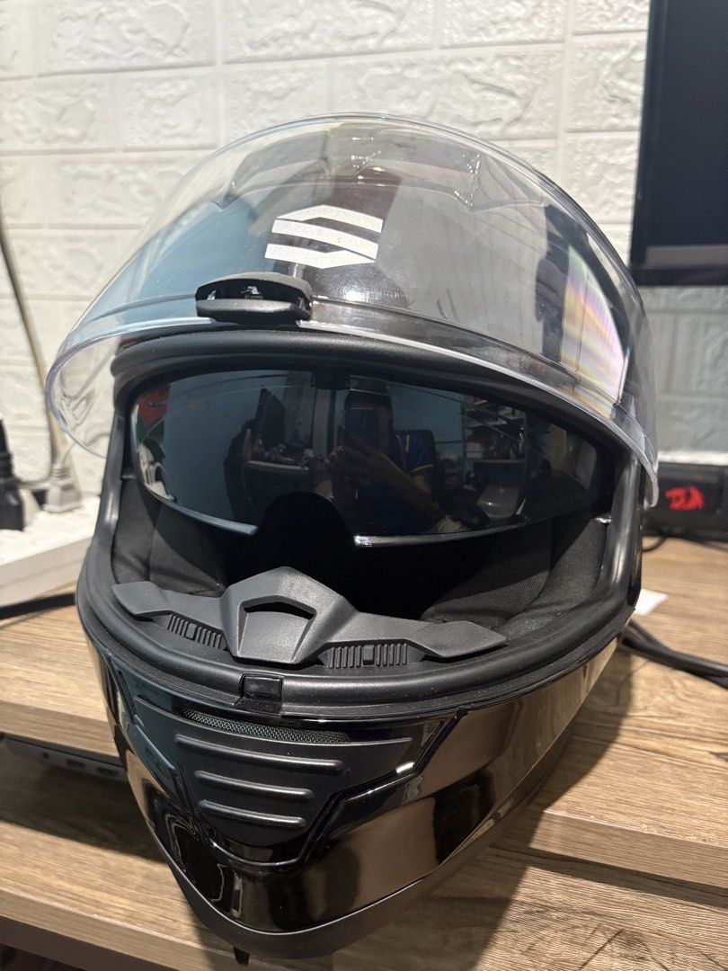 SEVEN Full Face Motorcycle Helmet with Sun Visor (Category: Helmets and other Riding Gears) located in Makati City. Submitted by madephie (Listing ID 1444316072, Image 1). Description: SEVEN po yung brand Minor scratches RFS: wrong size, bihira magamit at nakikiangkas lang minsan - SEVEN Full Face Helmet - Color: Black - Size: XL - Built-in retractable sun visor - ECE R 22-05 Certified - Weight: 1600 +/- 50g.