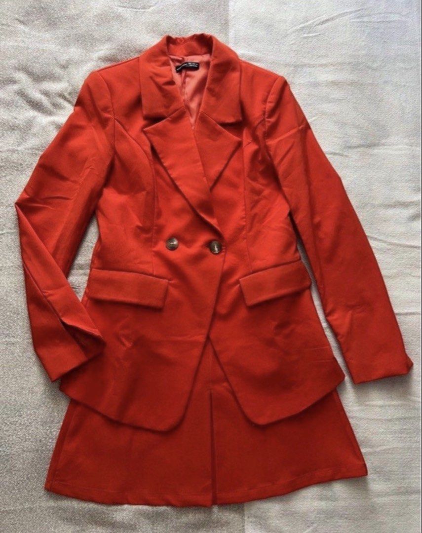 SHEIN Double-Breasted Blazer & Skirt Set (Category: Sets or Coordinates) located in Pasig City. Submitted by jenscloset86 (Listing ID 1444423722, Image 1). Description: Brand: SHEIN Size: SMALL • BRAND NEW. 2 pcs (Blazer & Skirt) • Never used, never worn. • No flaws, no damages. Measurement: Blazer — Shoulder: 16” Bust: 36” Length: 29.5” Sleeve: 26” Skirt —- Length: 17” Waist: 27” Hip: 39” - Orange double-breasted blazer by Evolushein - Features 