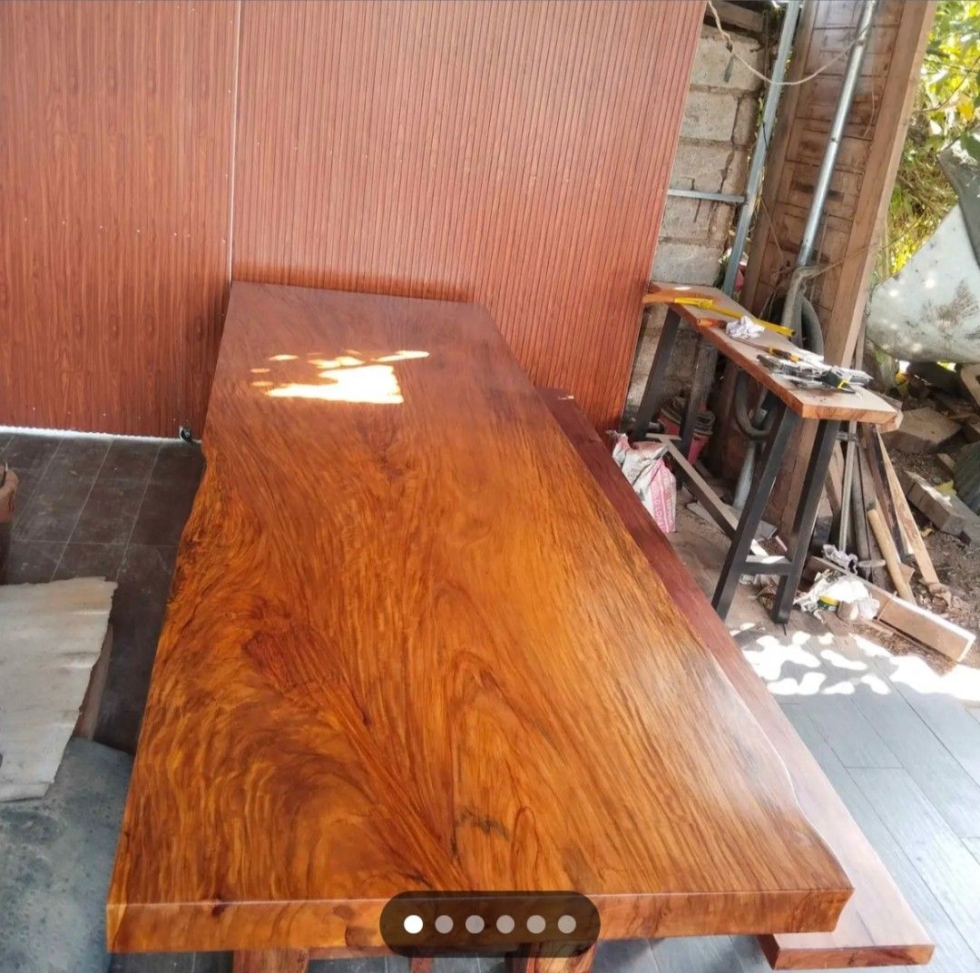 Solid Wood Live Edge Dining Table with Benches (Category: Tables & Sets) located in Manila. Submitted by rodelfabro14858 (Listing ID 1444342656, Image 2). Description: Long table Size:4x42x11ft Solid narra wood 12 seater -Beautiful solid wood dining table - Natural live edge with striking wood grain - Warm, rich wood tone - Sturdy construction - Ideal for large gatherings or as a statement piece.
