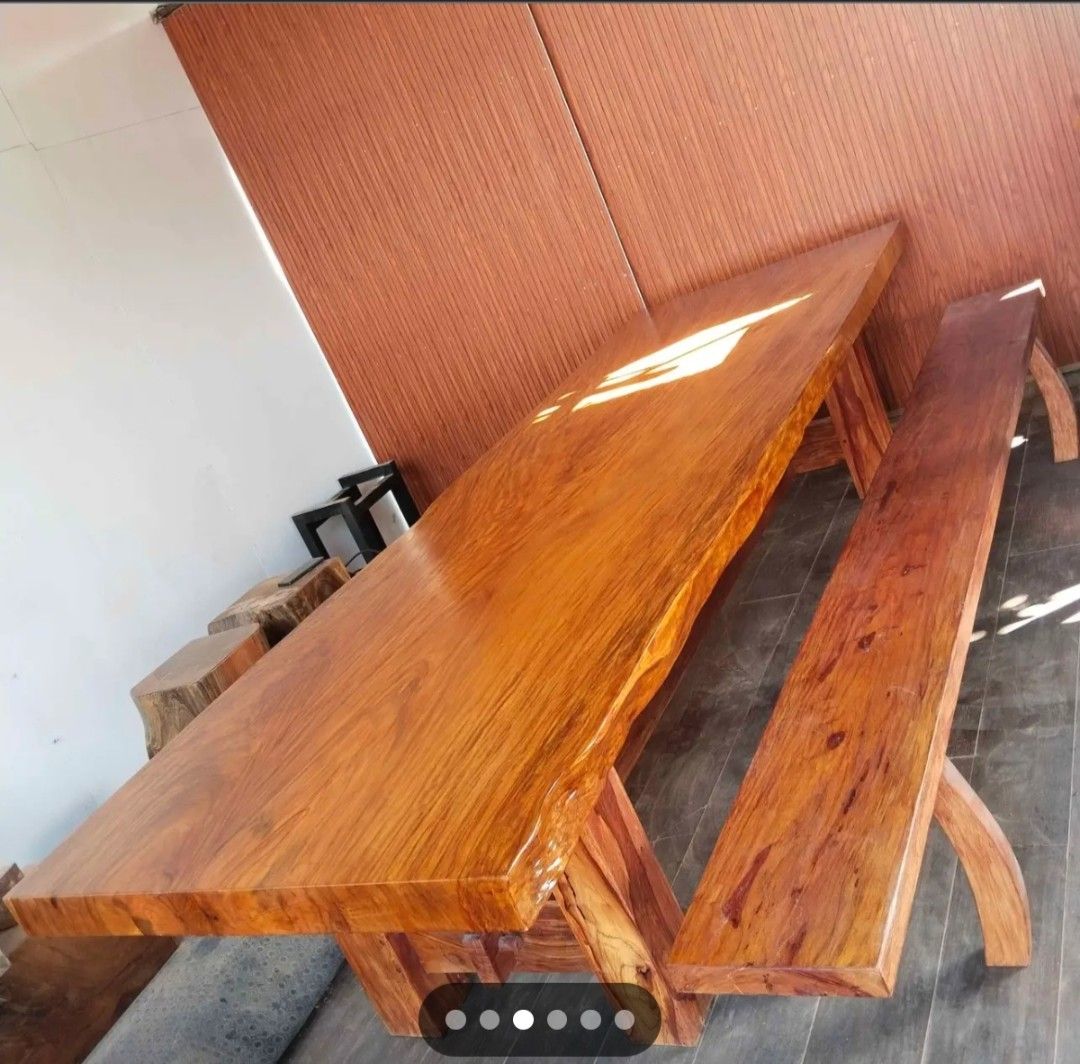 Solid Wood Live Edge Dining Table with Benches (Category: Tables & Sets) located in Manila. Submitted by rodelfabro14858 (Listing ID 1444342656, Image 3). Description: Long table Size:4x42x11ft Solid narra wood 12 seater -Beautiful solid wood dining table - Natural live edge with striking wood grain - Warm, rich wood tone - Sturdy construction - Ideal for large gatherings or as a statement piece.