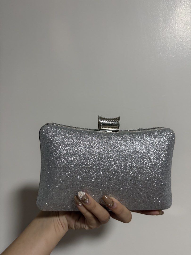Sparkly Silver Rhinestone Clutch Bag Evening Bag (Category: Clutches) located in Valenzuela. Submitted by pencakes_ (Listing ID 1444439899, Image 2). Description: sparkly silver pouch only used once for prom rfs - decluttering shipping fee will be shouldered by the buyer :).