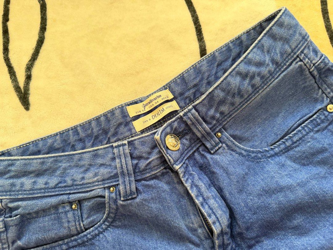 Stradivarius Blue Denim Cut-Off Shorts (Category: Shorts) located in Cebu City. Submitted by myclosettoyours_cebu (Listing ID 1444176500, Image 2). Description: - Brand: Stradivarius - Style: Blue denim shorts - Features: Classic five-pocket style, frayed hem detail - Fit: Comfortable for everyday wear - Versatile: Great for casual outings or lounging, easy to pair with tops.