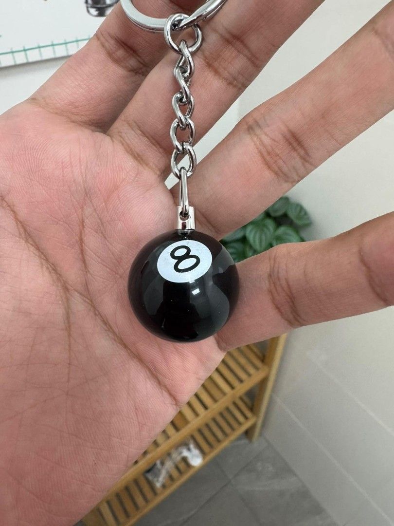 Stussy 8 Ball Keychain (Category: Luxury Accessories) located in Caloocan City. Submitted by ankng_mdr (Listing ID 1444495760, Image 2). Description: - Iconic Stussy 8-ball design - Durable metal chain and ring - Perfect accessory for keys or bags - Adds a stylish touch to your belongings.