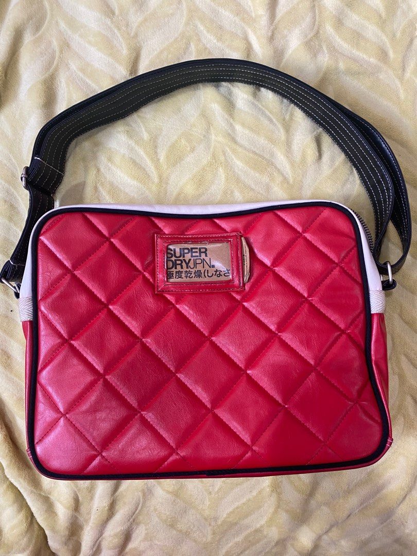 Superdry bag (Category: Cross-body Bags) located in Makati City. Submitted by jdeep9 (Listing ID 1444319438, Image 2). Description: Good condition. See pic for the issues. Yung mga white part need lang linisin..