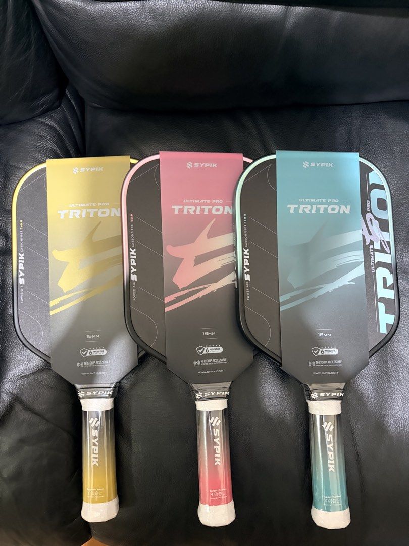 Sypik Triton Pro 5 (Pickleball Paddle) (Category: Racket and Ball Sports) located in Manila. Submitted by dinkrpaddlelab (Listing ID 1444403433, Image 1). Description: For Sale Sypik Triton Pro 5 (Brand New) ON HAND Last 2 pcs available Colors available: • Rise Pink • Chill Mint (SOLD) • Aura Gold 👉🏻 Elongated 👉🏻 16 mm Price: ₱9,300 Comes with: * Free paddle cover * Clear edge tape * Over grip (1 pc) Location: Pasay/Marikina/Manila/Makati.