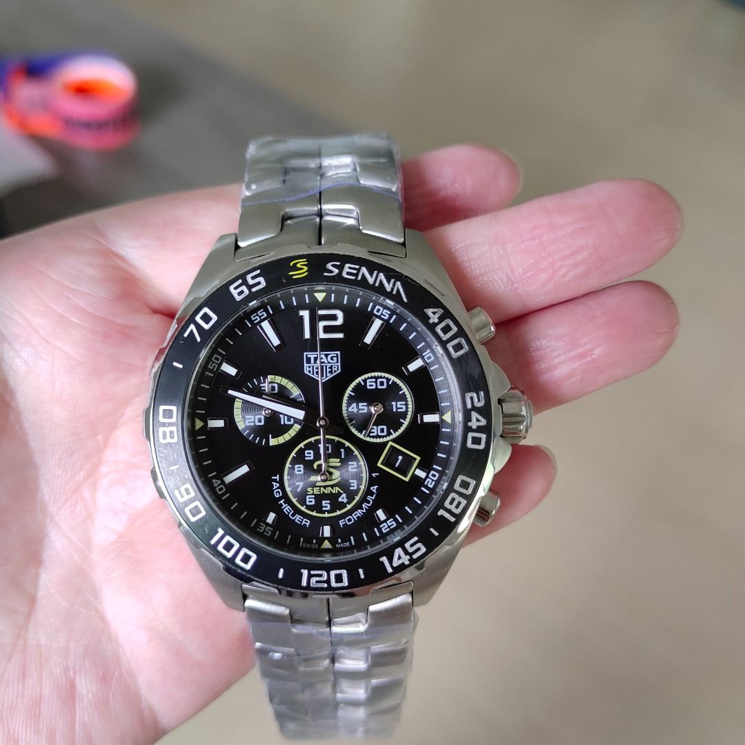 TAG Heuer Senna Chronograph Watch (Category: Men's Watches) located in Pasay City. Submitted by moldelanci79687 (Listing ID 1444372742, Image 2). Description: - Authentic TAG Heuer watch - Sleek black dial - Durable silver band - Features a precise chronograph function - Comes with original box - Includes international warranty card - Ideal for watch collectors and enthusiasts.