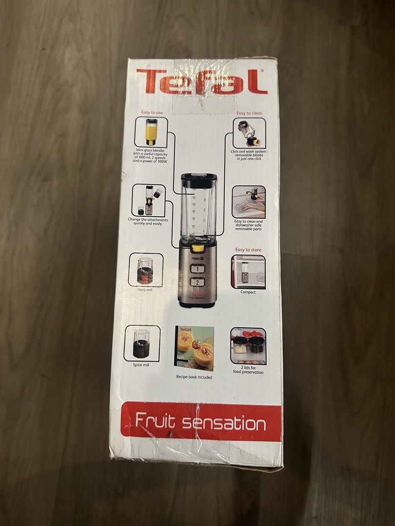 Tefal Fruit Sensation Blender (Category: Juicers, Blenders & Grinders) located in Quezon City. Submitted by prelovedbyasg (Listing ID 1444460333, Image 2). Description: - Tefal blender perfect for fruit smoothies, herbs, and spices. - Comes with 2 jars for convenient food preservation. - Includes a dedicated herb mill and spice mill. - Features an easy-to-use and clean Click and Lock system. - Dishwasher safe parts for hassle-free cleaning. - Rec