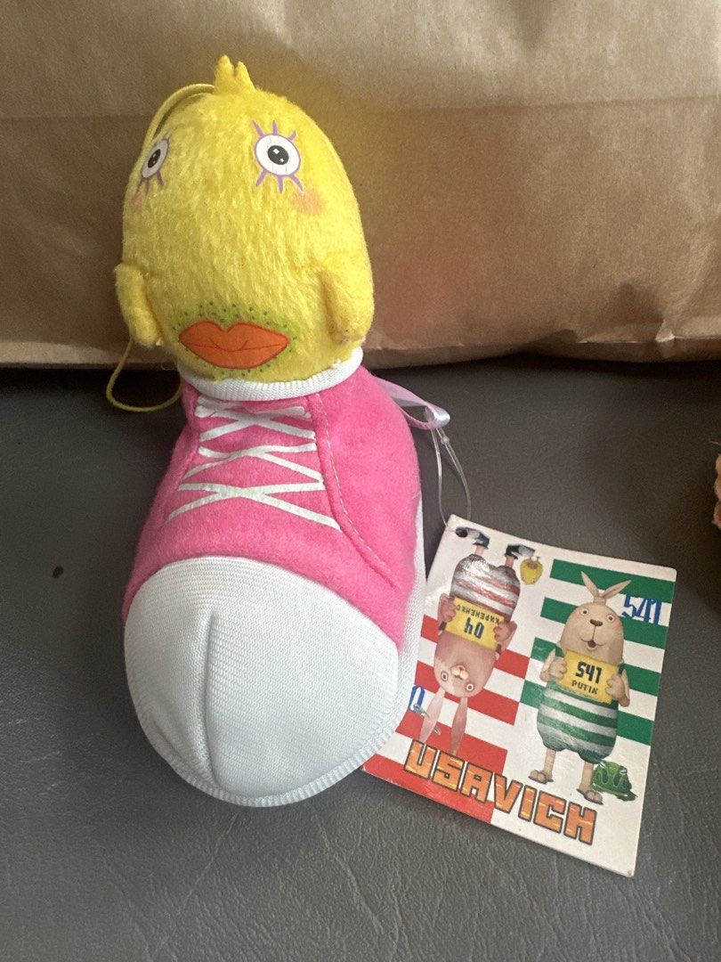 Usavich Plush Toy in Pink Sneaker (Category: Plushies & Soft Toys) located in Cainta. Submitted by shopbyyna (Listing ID 1444317617, Image 1). Description: - Adorable Usavich plush toy - Features a cute pink sneaker - Includes original tag with character details - Ideal for fans of the Usavich show - Unique collectible item.