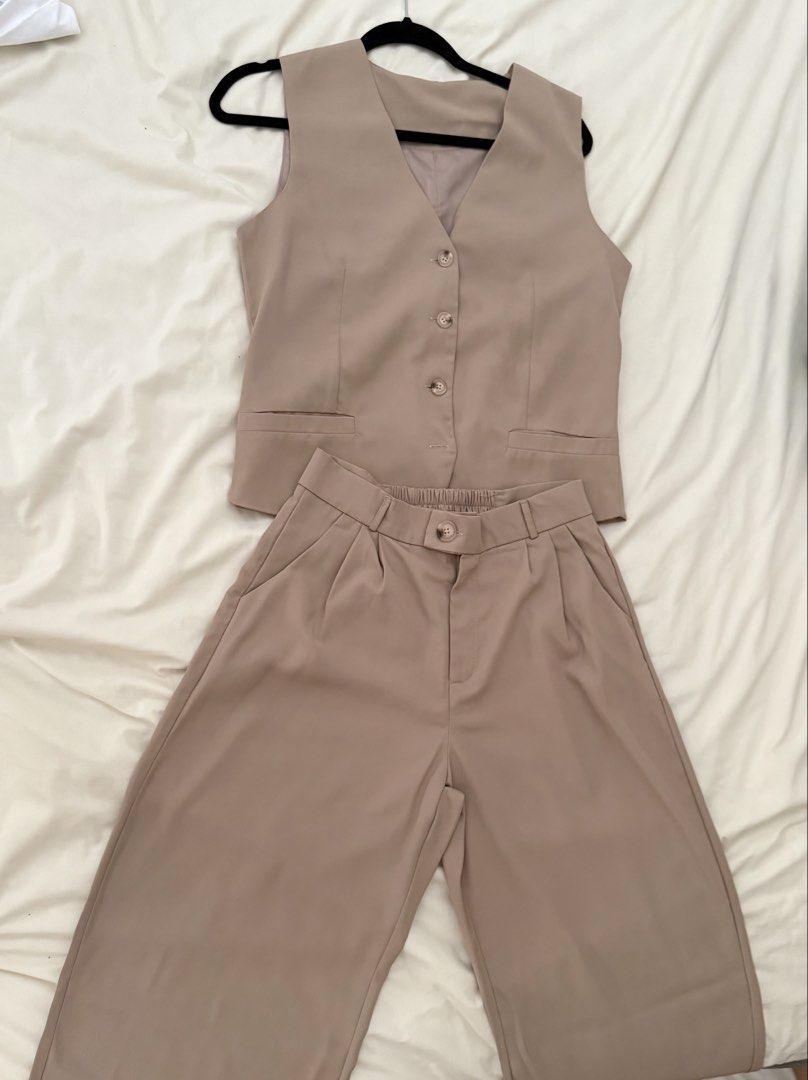 Vest & Trouser Set (Category: Sets or Coordinates) located in Paranaque City. Submitted by luluswardrobe (Listing ID 1444454332, Image 2). Description: Khaki Vest & Trouser Pants No brand Looks new Large on Tag but Best fits Medium Waist up to 32” comfortable fit .