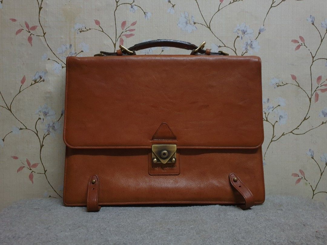 Vintage Leather Briefcase - Guy Laroche (Category: Briefcases) located in Quezon City. Submitted by WasalakTwo (Listing ID 1444491072, Image 1). Description: Bought in Japan Rare and hard to come by Excellent condition Clean and presentable 30cm x 40cm Open for delivery nationwide.