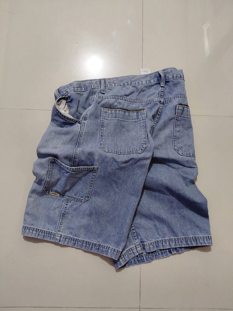 Vintage Levis Strauss Carpenter Jorts (Category: Shorts) located in Candaba. Submitted by ThrifthingsPH02 (Listing ID 1444403895, Image 3). Description: Vintage Levis Strauss Carpenter Jorts - Light wash denim carpenter Jean shorts - Multiple pockets for convenience - Secure button and zip closure - Comfortable fit for everyday wear - Perfect for casual outings -Size 34 waistline 17" on tapemeasure -23" Length below the knee -13" Leg opening Very
