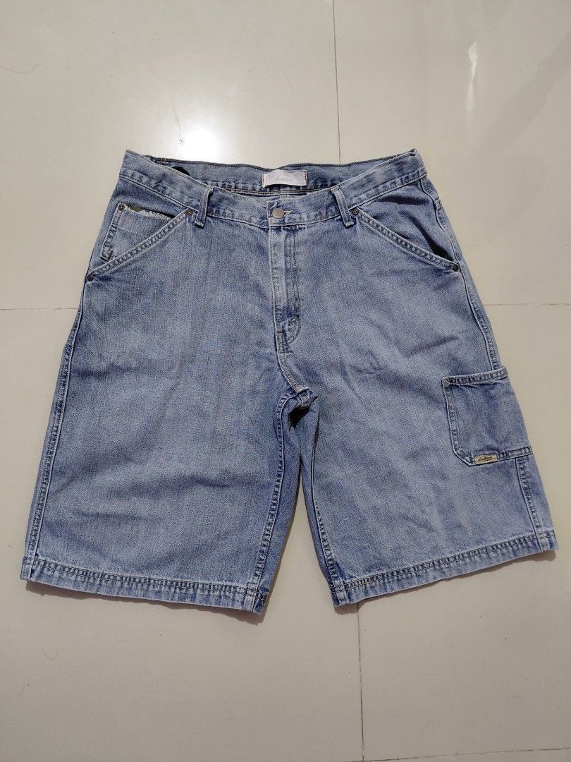 Vintage Levis Strauss Carpenter Jorts (Category: Shorts) located in Candaba. Submitted by ThrifthingsPH02 (Listing ID 1444403895, Image 1). Description: Vintage Levis Strauss Carpenter Jorts - Light wash denim carpenter Jean shorts - Multiple pockets for convenience - Secure button and zip closure - Comfortable fit for everyday wear - Perfect for casual outings -Size 34 waistline 17" on tapemeasure -23" Length below the knee -13" Leg opening Very