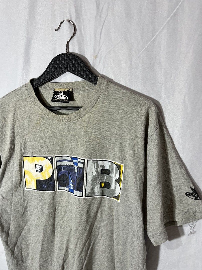 Vintage PNB nation shirt (Category: Tshirts & Polo Shirts ) located in Cagayan de Oro. Submitted by smoothstyle (Listing ID 1444455455, Image 2). Description: Vintage PNB nation shirt Good condition 9/10 color rate size large dimes: 22x29 Issue: Washable yellow stain and hairline Crackprint .