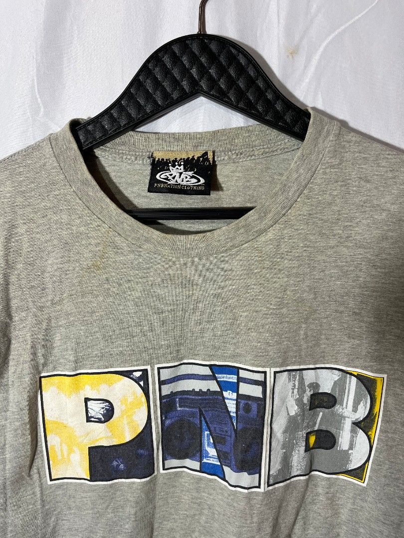 Vintage PNB nation shirt (Category: Tshirts & Polo Shirts ) located in Cagayan de Oro. Submitted by smoothstyle (Listing ID 1444455455, Image 3). Description: Vintage PNB nation shirt Good condition 9/10 color rate size large dimes: 22x29 Issue: Washable yellow stain and hairline Crackprint .