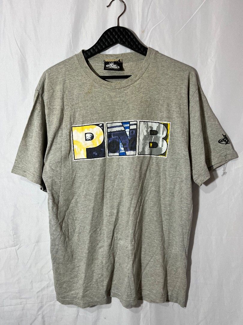 Vintage PNB nation shirt (Category: Tshirts & Polo Shirts ) located in Cagayan de Oro. Submitted by smoothstyle (Listing ID 1444455455, Image 1). Description: Vintage PNB nation shirt Good condition 9/10 color rate size large dimes: 22x29 Issue: Washable yellow stain and hairline Crackprint .