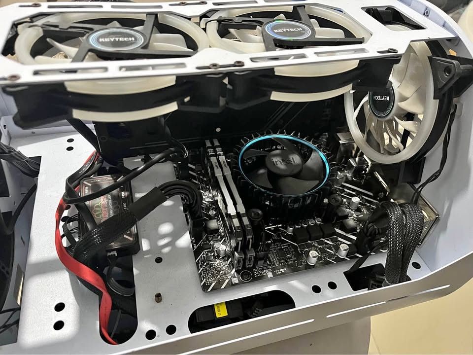 White Futuristic Computer Case with RGB Fans (Category: Desktops) located in Manila. Submitted by danndimes (Listing ID 1444355616, Image 3). Description: I5 14400 1tb nmve Asus KO Rtx 3060 ti v2 Oc Asus prime h610m k-d4 Kingston RGB DDR4 16gb and 8gb Corsair CV650 bronze Space Capsule Case.