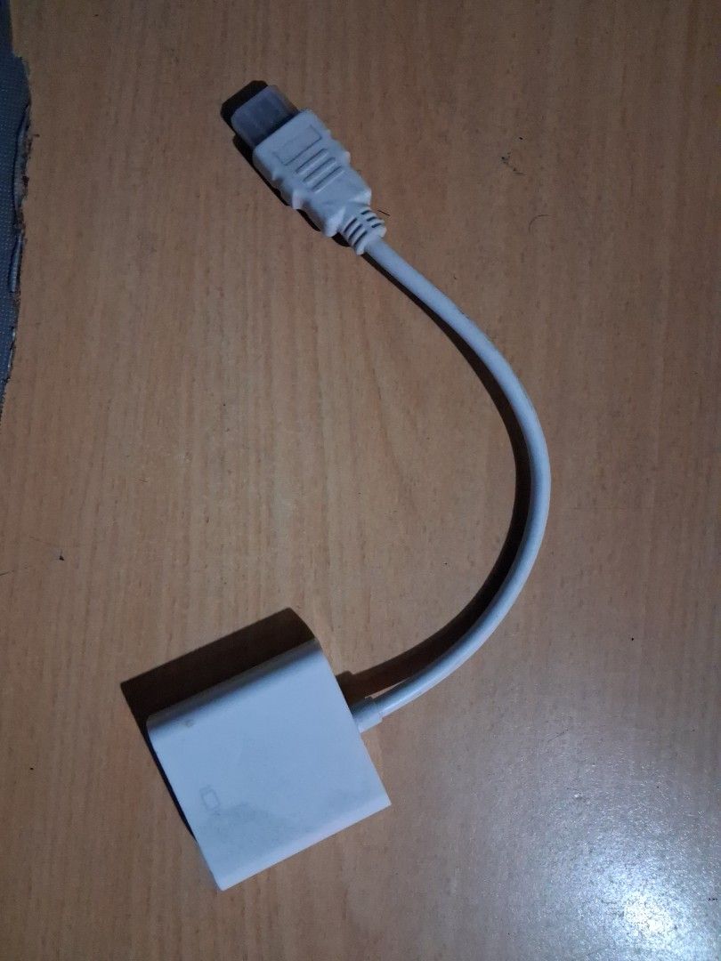 White HDMI to VGA Adapter Converter Cable (Category: Cables & Adaptors) located in Mandaluyong City. Submitted by eyji569 (Listing ID 1444469044, Image 1). Description: - Connect HDMI devices to VGA monitors/projectors. - White color with a flexible cable. - Simple plug-and-play setup. - Ideal for presentations and extending your display. - Compact and portable design. - Compatible with laptops, computers, and other HDMI sources..
