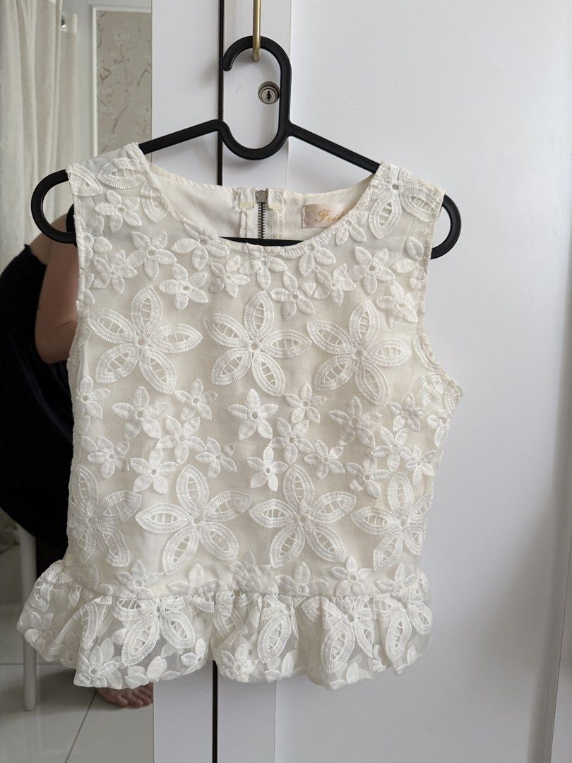 White Sleeveless Top with embroidered flowers (Category: Blouses) located in Taguig. Submitted by kaiteano (Listing ID 1444322062, Image 1). Description: Last price posted. .