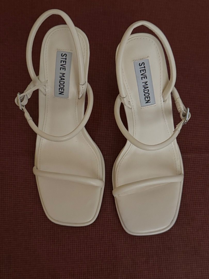 White wedding sandals (Category: Flats & Sandals) located in Las Pinas. Submitted by declutter.with.love (Listing ID 1444492210, Image 1). Description: Authentic Steve Madden white sandals US 5 No box.