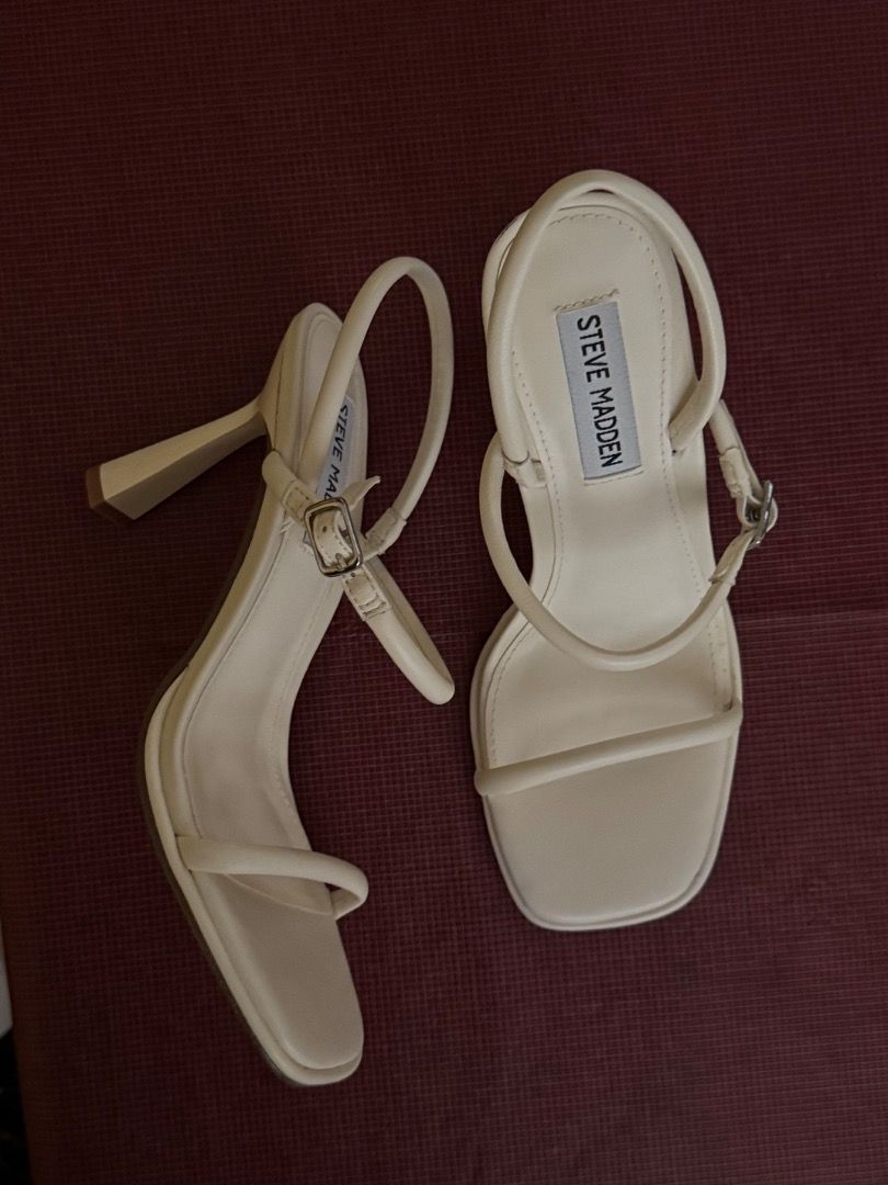White wedding sandals (Category: Flats & Sandals) located in Las Pinas. Submitted by declutter.with.love (Listing ID 1444492210, Image 2). Description: Authentic Steve Madden white sandals US 5 No box.