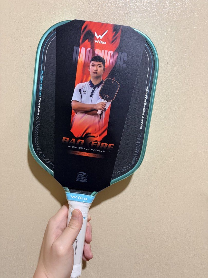 Wika Bao Fire 2 (Pickleball Paddle) (Category: Racket and Ball Sports) located in Manila. Submitted by dinkrpaddlelab (Listing ID 1444403746, Image 1). Description: For Sale Wika Bao Fire 2 (Brand New) ON HAND LAST PC AVAILABLE Colors available: • Teal 👉🏻 Elongated 👉🏻 16 mm Price: ₱6,300 Comes with: * Free paddle cover * Clear edge tape * Over grip (1 pc) Location: Pasay/Marikina/Manila/Makati.