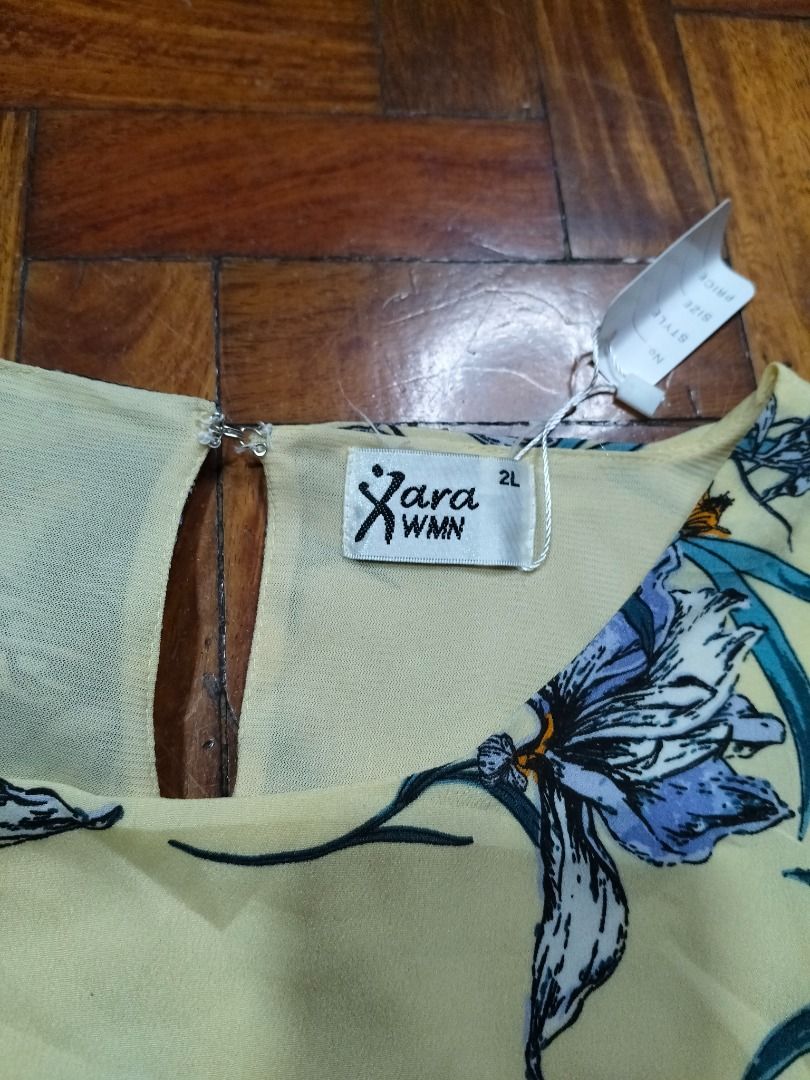 XARA WMN Floral Print Top (Category: Others Tops) located in Quezon City. Submitted by mjar_ (Listing ID 1444429057, Image 3). Description: XARA WMN Floral Print Top Size: 2L - Long sleeves and a classic round neckline - Elegant touch with a small keyhole detail at the back - Ideal for effortless casual styling Disclaimer: Product color may slightly vary due to photographic lighting sources or your screen’s resolution and settings..