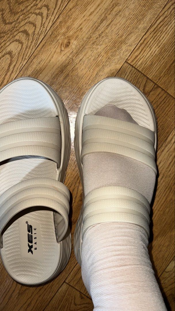 XES BASIC Beige Platform Sandals (Category: Sandals) located in Kuala Lumpur. Submitted by iaamdie (Listing ID 1444365413, Image 1). Description: - Brand: XES BASIC - Color: Beige - Style: Platform Sandals - Features: Easy slip-on, two wide straps, good grip sole - Occasion: Casual wear - Condition: Worn a few times, still in good shape.