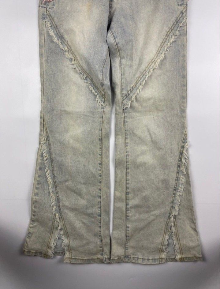 Y2K Distressed Pink Lace Gray Flare Pants (Category: Jeans) located in Santa Rosa. Submitted by bgcoded (Listing ID 1444478148, Image 3). Description: has a minor yellowish stain, barely noticeable ww (see pictures for ref) waist: approx 27 in. hips: 30 in. length: 40 in..
