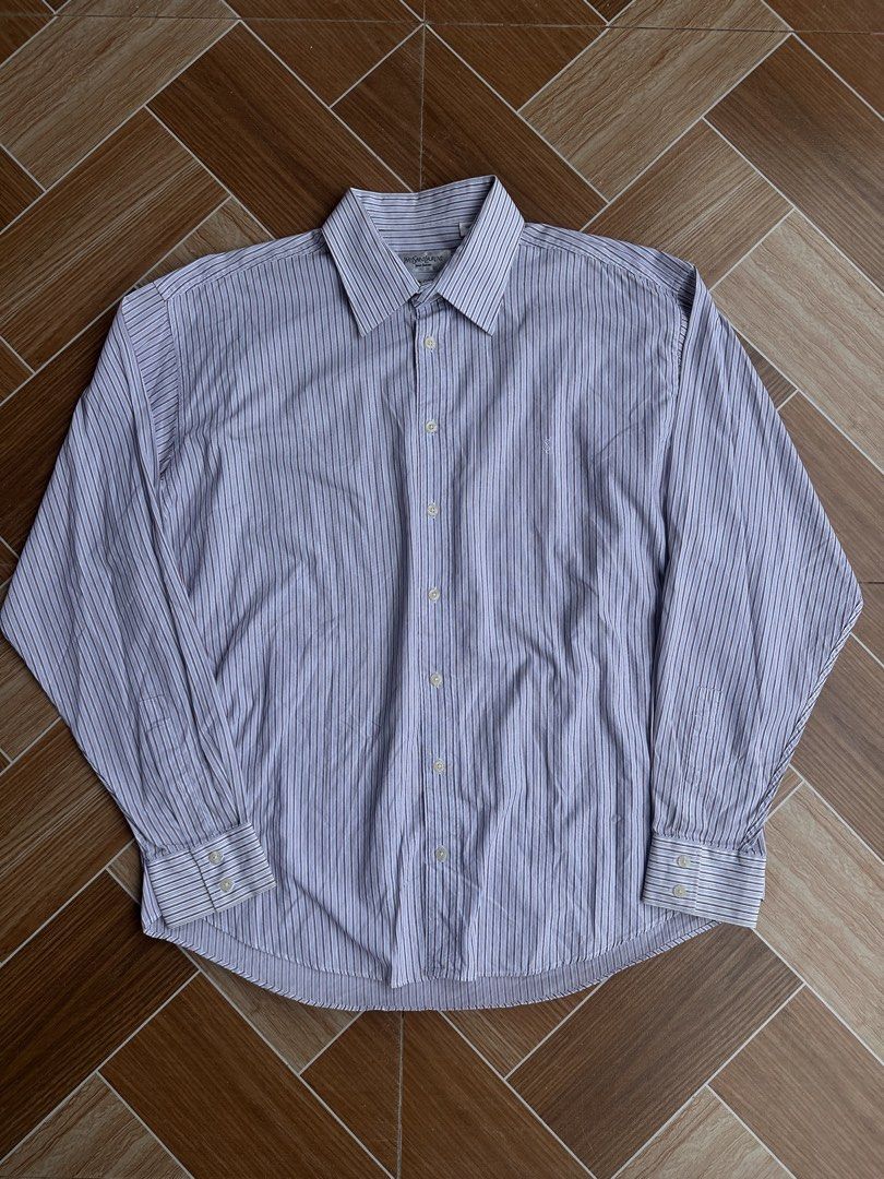 Yves Saint Laurent Men's (Category: Luxury Apparel) located in Davao. Submitted by kurttyyo (Listing ID 1444389173, Image 2). Description: - Classic Yves Saint Laurent dress shirt - Fine blue and maroon pinstripes on white - 100% cotton for ultimate comfort - Long sleeves with button cuffs - Button-down front - Small embroidered YSL logo on chest - Ideal for formal events or smart-casual styling YSL XL | 27.5 x 31f 32b Excellent 1,200.