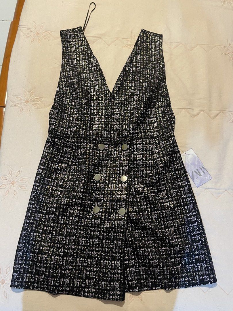 Zara Tweed Double-Breasted Mini Dress (Category: Dresses) located in Manila. Submitted by stargirl05 (Listing ID 1444420450, Image 1). Description: - Zara dress - Tweed-like fabric - Black and white pattern with metallic thread accents - V-neckline - Double-breasted button detail - Sleeveless - Versatile for dressing up or down - Retails for 2800.