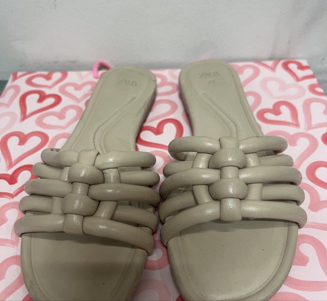 ZARA Woven Strap Flat Sandals Beige Size 36 (Category: Flats & Sandals) located in Manila. Submitted by kittycat_preloved (Listing ID 1444374696, Image 3). Description: - Brand: ZARA - Type: Flat Sandals - Color: Beige - Design: Woven strap across the front - Style: Easy slip-on - Size: 36 - Perfect for: Casual outings, running errands - Condition: Please check photos for details.