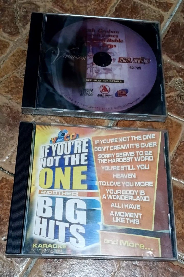 2 Video Karaoke CDs: Big Hits & Virtuosos (Category: CDs & DVDs) located in Quezon City. Submitted by dancatz (Listing ID 1444531262, Image 1). Description: □ P 150.00 each - Two Video Karaoke CDs (VCD) for sale. - CD 1: 'If You're Not The One and Other Big Hits' - CD 2: 'Virtuosos' featuring Josh Groban, Josh Jones, and Michael Buble - Ideal for karaoke nights and singing sessions. - Get ready to sing your heart out! LFB Seller location : Brgy. 