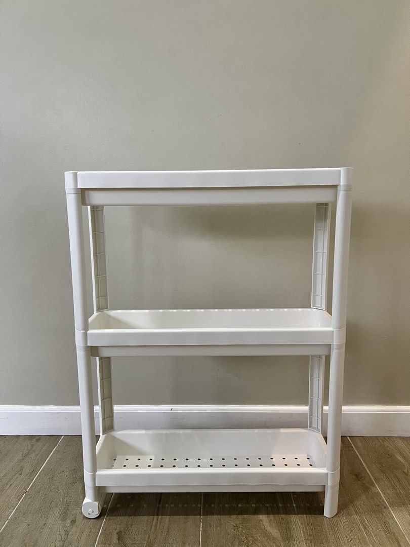 3-Tier Trolley Cart Slim Rack, White (Category: Storage Boxes & Baskets) located in Bacoor. Submitted by mariiiaph (Listing ID 1444658563, Image 3). Description: 3-Tier Trolley Cart Slim Rack on wheels storage, White Brand: Ikea This slim, 3-tier rolling cart is perfect for small spaces like bathrooms, kitchens, laundry areas, or even offices. white design adds a modern touch, while the open shelves make it easy to see and grab what you need. Lig