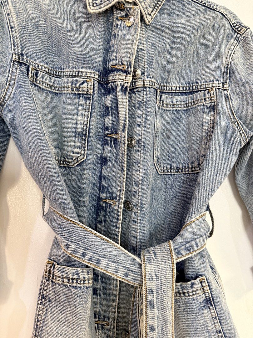 Acid Wash Denim Jacket with Belt (Category: Coats, Jackets and Outerwear) located in Quezon City. Submitted by yourheaduhunter (Listing ID 1444563449, Image 2). Description: - Trendy acid wash denim jacket - Features a tie belt to cinch the waist - Classic button front closure - Two convenient chest pockets - Perfect for layering or wearing as a standalone piece - A timeless staple with a modern twist.