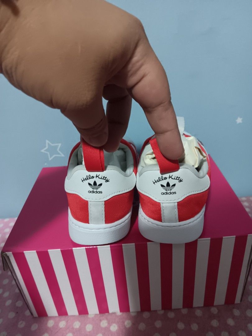 Adidas x Hello Kitty Superstar 360 Shoes (Category: Babies & Kids Fashion) located in Valenzuela. Submitted by hailiesminicloset (Listing ID 1444632528, Image 3). Description: - Adorable red Adidas Superstar 360 shoes - Features a cute Kitty design - Easy slip-on style for kids - Iconic Adidas three stripes and shell toe - Ideal for Kitty enthusiasts - Includes original box.