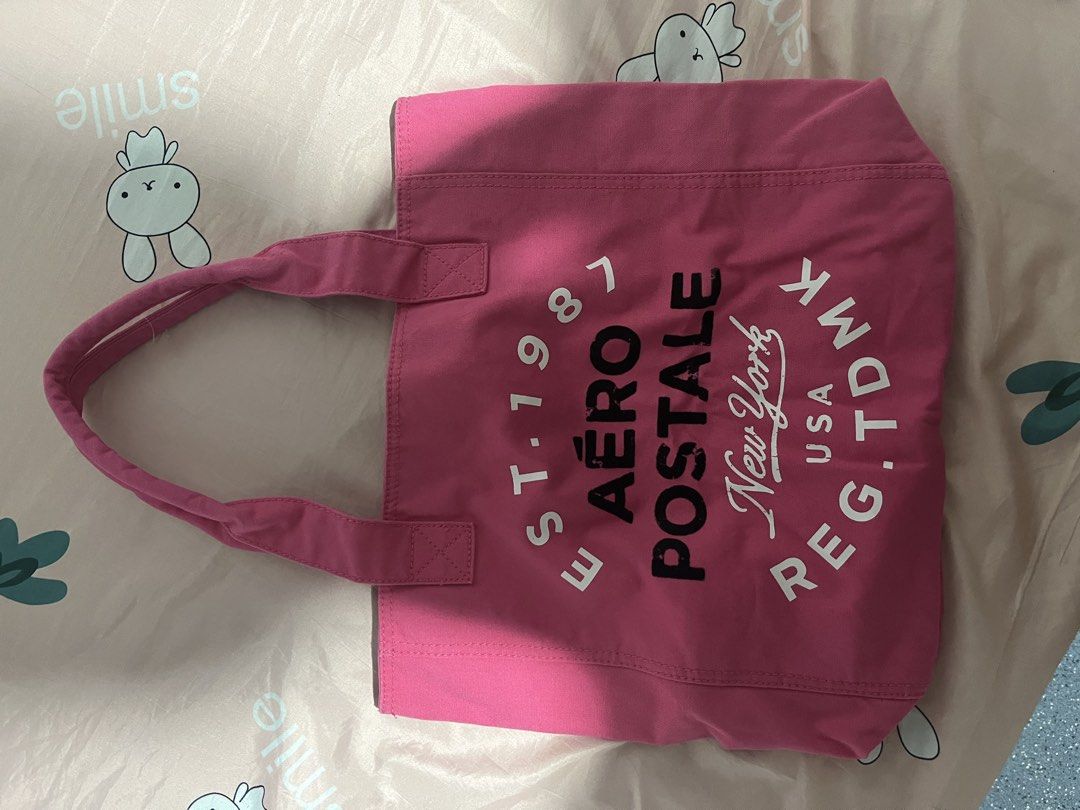 Aeropostale Pink Tote Bag (Category: Tote Bags) located in Manila. Submitted by hi_abbd (Listing ID 1444645282, Image 1). Description: Never used -Aeropostale Pink tote bag - Size attached .