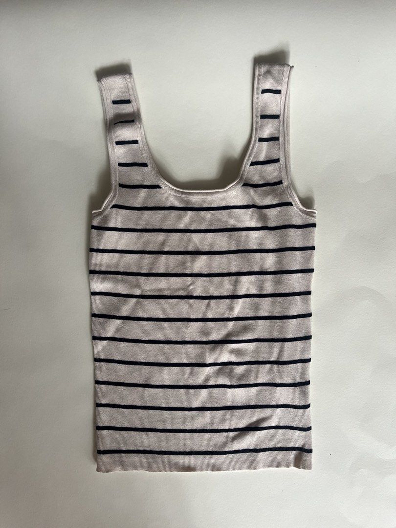 Anko Striped Tank Top Size 8 (Category: Sleeveless) located in Quezon City. Submitted by barthesbie (Listing ID 1444522253, Image 1). Description: - Cute Anko tank top - beige with black stripes - Size 8 - Made in Bangladesh - Great for layering or wearing on its own.