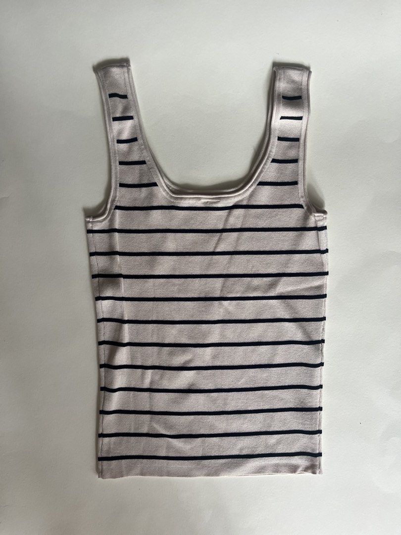 Anko Striped Tank Top Size 8 (Category: Sleeveless) located in Quezon City. Submitted by barthesbie (Listing ID 1444522253, Image 2). Description: - Cute Anko tank top - beige with black stripes - Size 8 - Made in Bangladesh - Great for layering or wearing on its own.