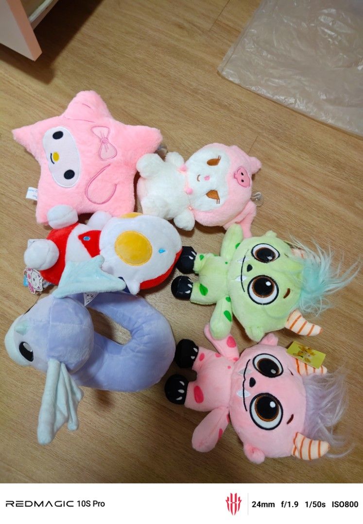 Assorted Plush Toys - My Melody, Ultraman, Dragon(Pokemon), Monsters (Category: Plushies & Soft Toys) located in Singapore. Submitted by ayemyanyei17586 (Listing ID 1444533003, Image 2). Description: - Bundle of cute plush toys - Includes My Melody star, Ultraman, purple dragon, and monster characters - All plushies are soft and cuddly - Ideal for collectors or as gifts - Fun addition to any collection.