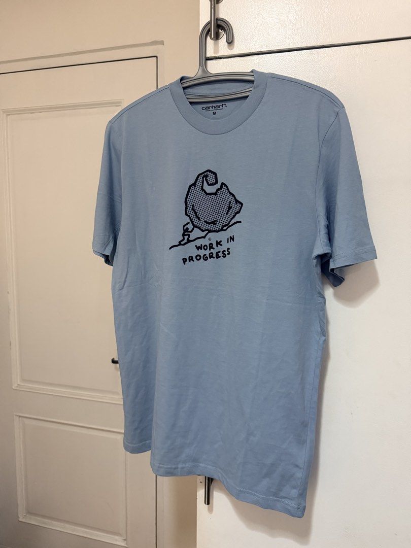 (Authentic) Carhartt WIP Work In Progress Move On Up Shirt (Category: Tshirts & Polo Shirts ) located in Cavite. Submitted by kumbin (Listing ID 1444528190, Image 2). Description: Carhartt WIP S/S Move On Up T Shirt (Legit) Color: Dusty Ice 🥶💙 Fabric: Soft cotton Dimensions: 20 by 29 inches (size M on tag, fits S-M) Issue: None, almost new condition 💯 just 1 dot mending (last pic, barely noticeable) Condition/color rate: 9.8/10 almost new 🔥 +