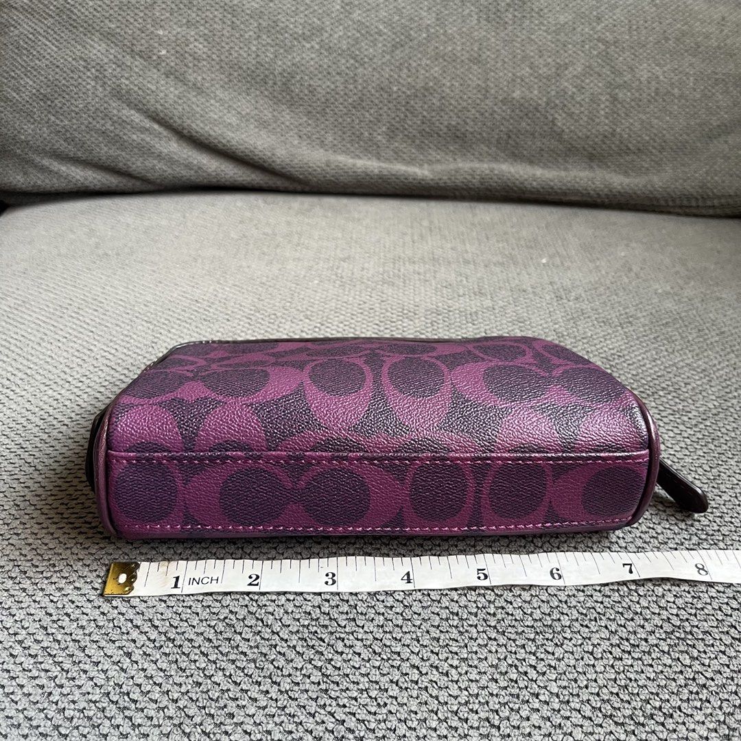 Authentic Coach Japan Leather Purple Monogram Makeup Bag Pouch (Category: Purses & Pouches) located in Silang. Submitted by f4iry4rch1ve (Listing ID 1444598544, Image 3). Description: Authentic Coach Japan Leather Purple Monogram Makeup Bag Pouch 1200 php+ sf Condition: 10/10 Dimensions: view the pictures above -authentic (no brand tag but it is auth, you may search it on Google) -from Japan - actual photos Note: Colors may vary due to lighting P